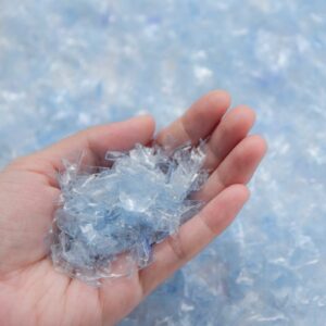 shredded PET plastic light blue ready for recycling